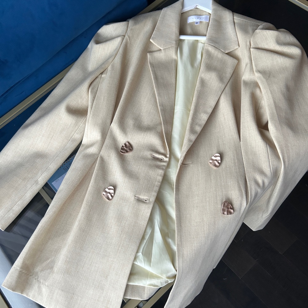 Elegant Cream Blazer with Unique Buttons